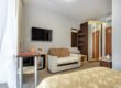 minsk belarus october 2020 interior modern guestroom studio apartments hotel with sofa table armchairs red carpet led light