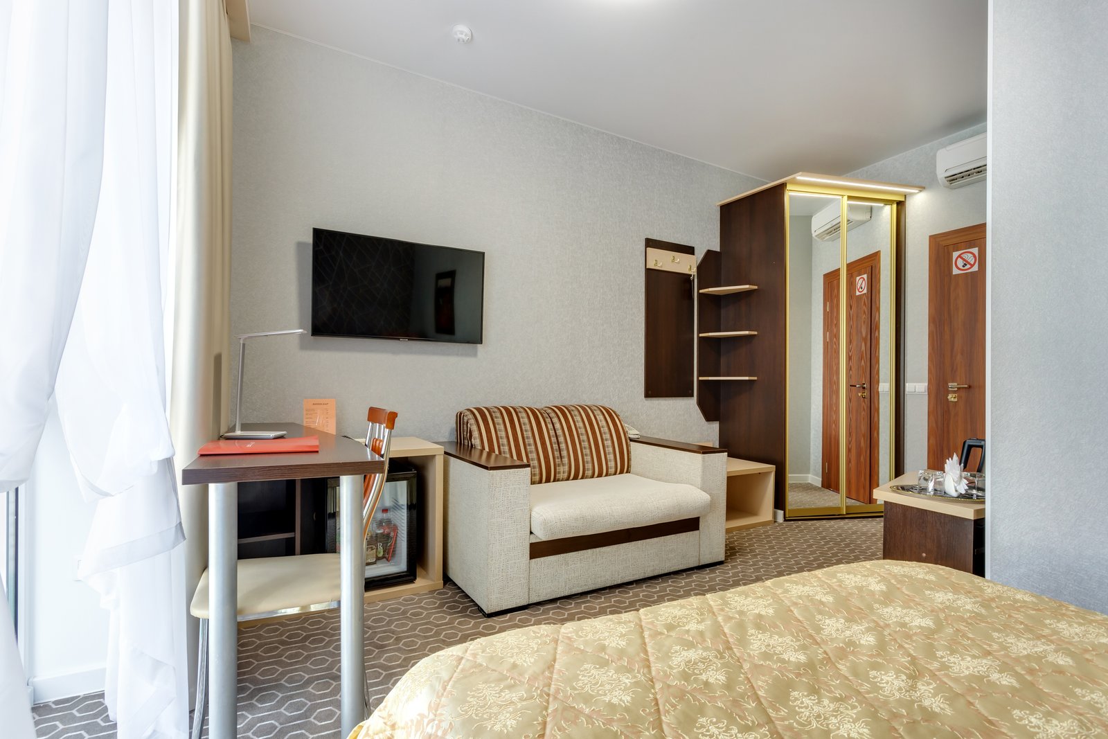 minsk belarus october 2020 interior modern guestroom studio apartments hotel with sofa table armchairs red carpet led light